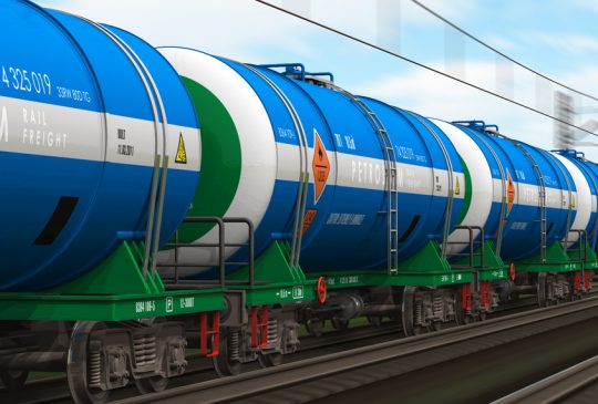 Freight train with petroleum tanker cars